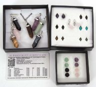 A quantity of hardstone jewellery: a boxed set of seven silver crystal pendants; a boxed set of four