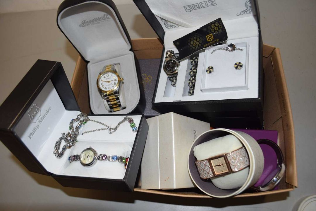 Box of various wristwatches