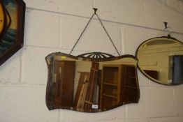 An early 20th Century bevelled wall mirror in Art Deco style frame