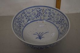 A 20th Century blue and white pedestal bowl with floral decoration