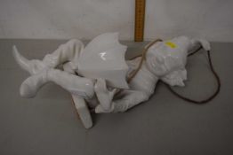 A porcelain model hanging clown