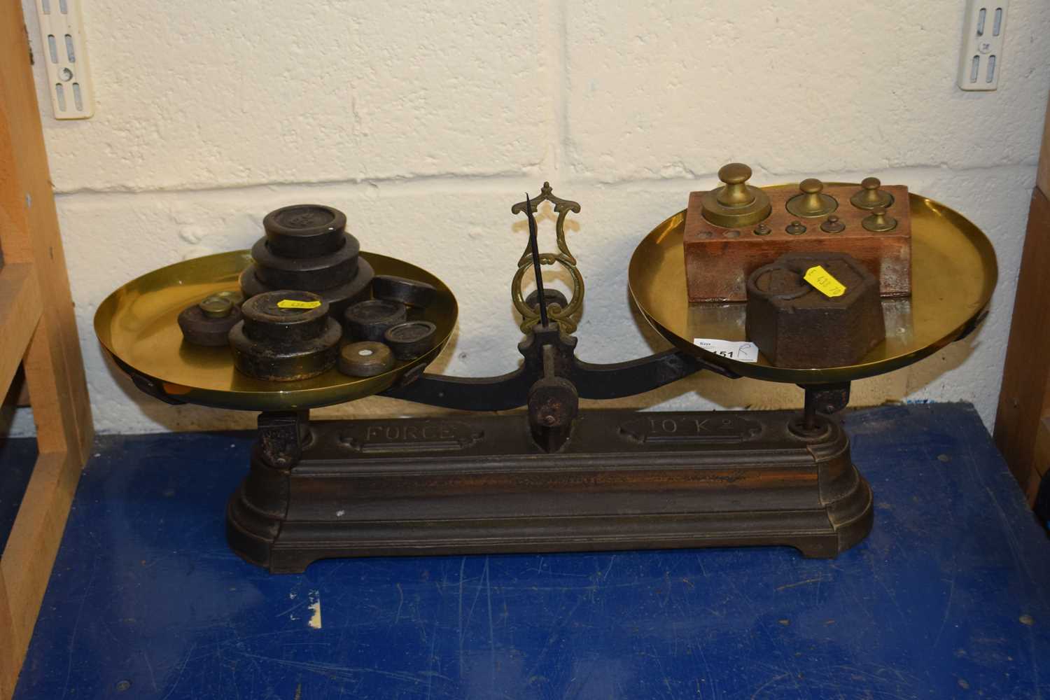 A large Victorian scale with a quantity of weights