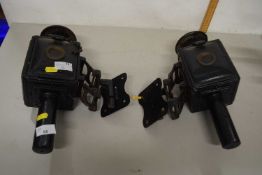 A pair of vintage coach lamps