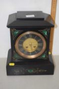 Late Victorian black slate cased mantel clock with brass movement striking on a coiled gong