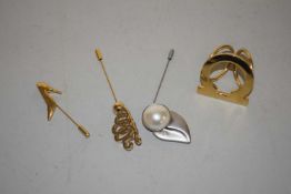Four Salvatore Ferragamo scarf pins, (4)