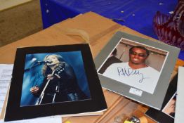 Mixed Lot: Signed photographs to include Puff Daddy