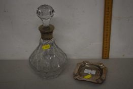 Small hallmarked silver ashtray together with a further decanter with white metal collar