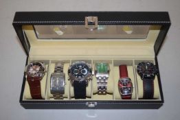 A case of six gents modern wristwatches