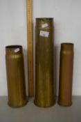 Group of three military brass shell cases, WWI and others