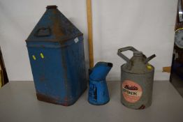 A group of three vintage oil cans and a paraffin can by Aladin, together with a further large pink
