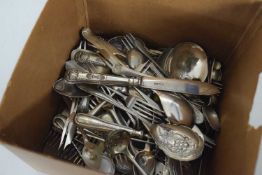 Box containing a quantity of plated cutlery