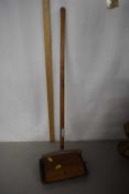A Little Jewel carpet sweeper of toy size with wooden handle made by Bissell