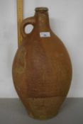 A large stone ware flagon indistinctly marked, 48cm high