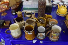 A quantity of pottery jugs, Falcon ware, Beswick etc