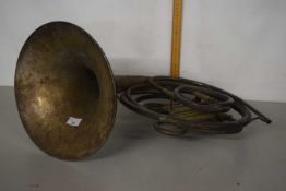 A vintage metal horn instrument