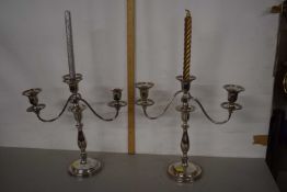 A pair of silver plated candelabra