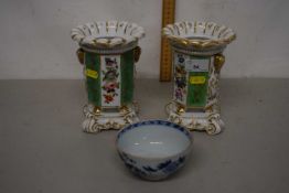 A pair of porcelain vases, probably Paris, finely painted with floral decoration with panels of