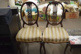 A pair of dining chairs