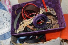 Two boxes of assorted belts etc