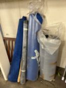 Quantity of five various rolls of coloured fabric etc