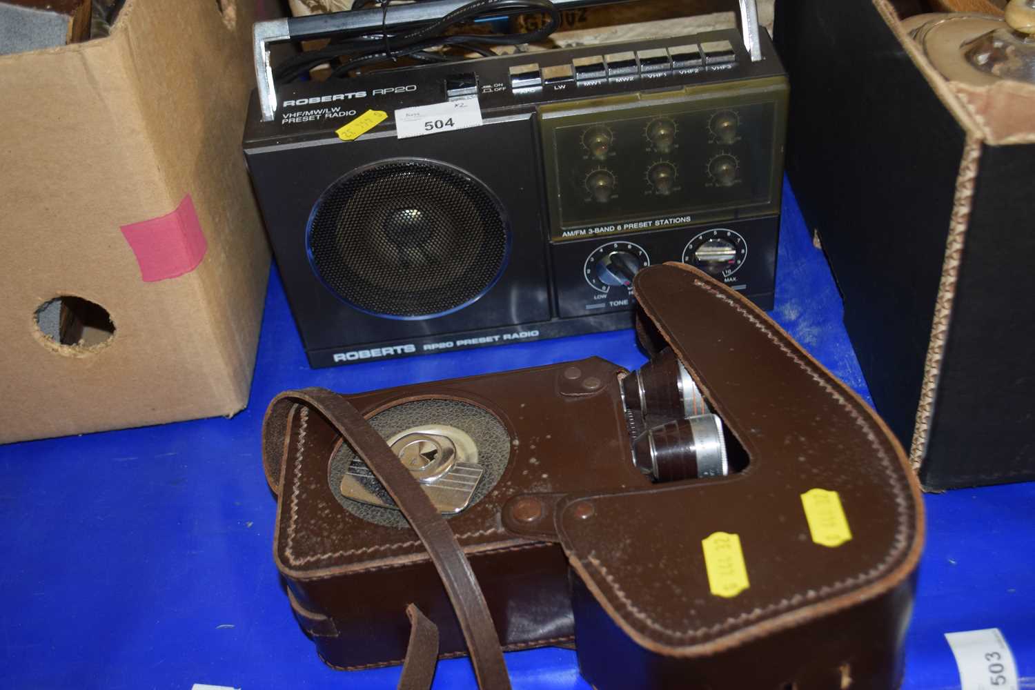 A Roberts RP20 VHF/MW/LW pre-set radio together with a vintage Brownie movie camera in leather case