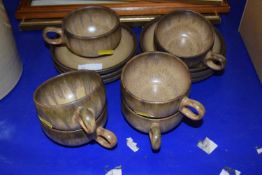 A quantity of Denby wares, cups and saucers