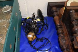 A ceiling hanging light with chains