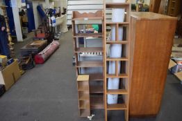 A group of three various assorted small shelf units