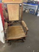 An Edwardian upholstered rocking chair