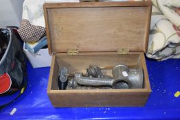 A boxed vintage food chopper and meat grinder