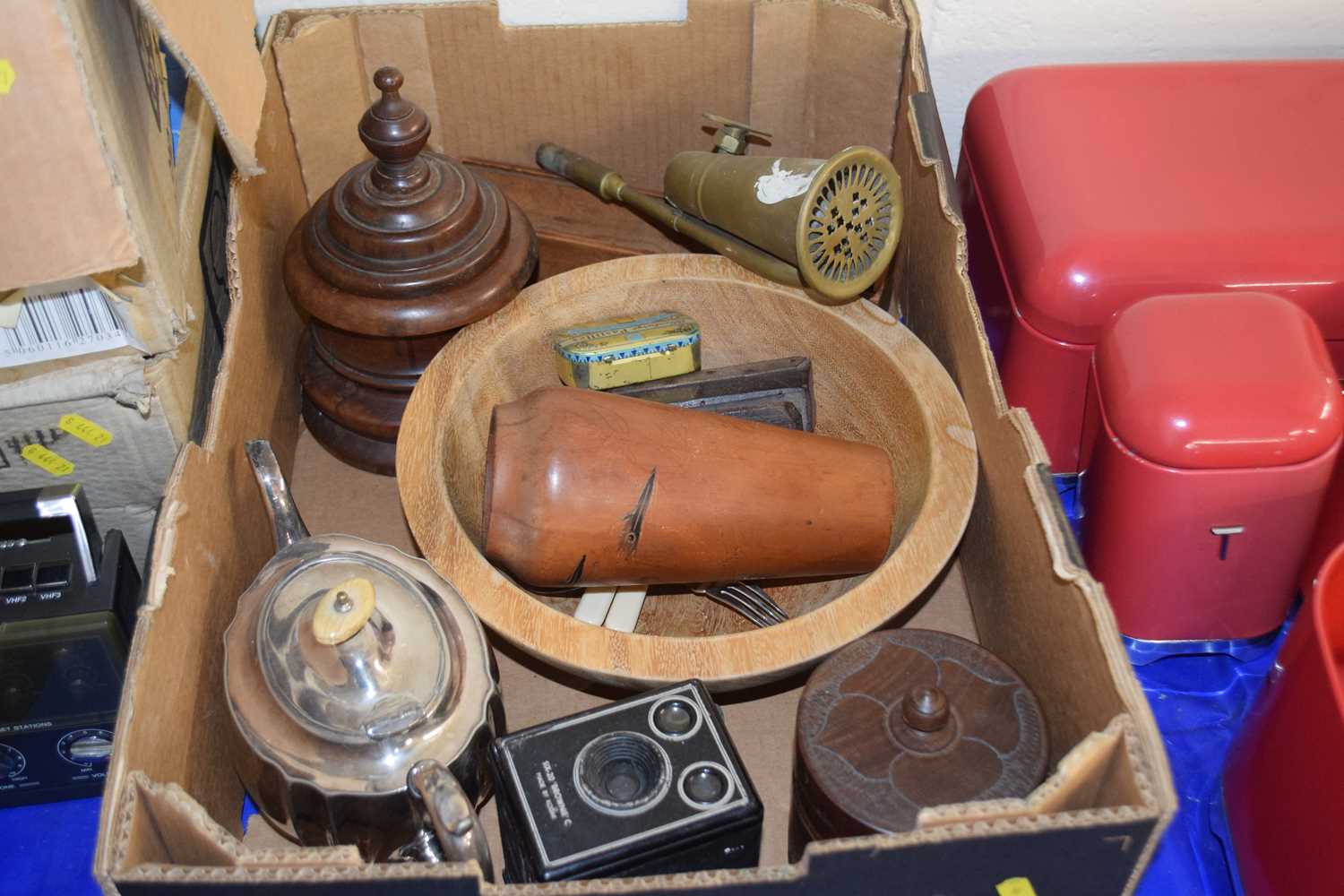 Mixed Lot: Cutlery, silver plated teapot, old Brownie camera, two turned wooden tobacco jars and a