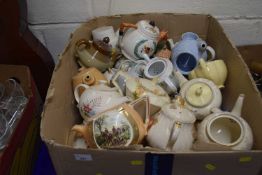 Large box of assorted teapots to include ceramic and porcelain examples