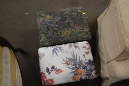 Two upholstered footstools
