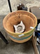 Three terracotta plant pots