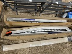 A pair of 7.5 foot folding arch model ramps