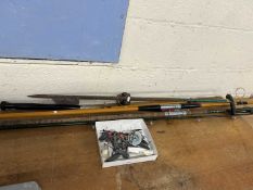 Fishing rods together with a mixed quantity of fishing weights and dinghy anchor