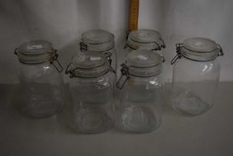 Six kitchen storage jars