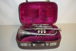 A silver plated Lark trumpet