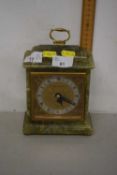 A mantel clock in onyx case, retailed by Mappin & Webb with Elliott block