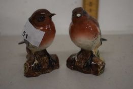 Two Beswick Robin's