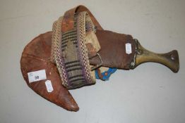 A 20th Century leather cased Jambiya with attached belt