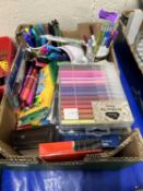 A box of various assorted crayons, pens etc