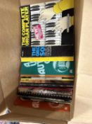 Box of music books for piano