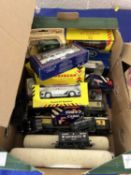 Box of model railway rolling stock, modern collectors cars and vans