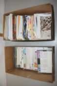 Two boxes of assorted postcards