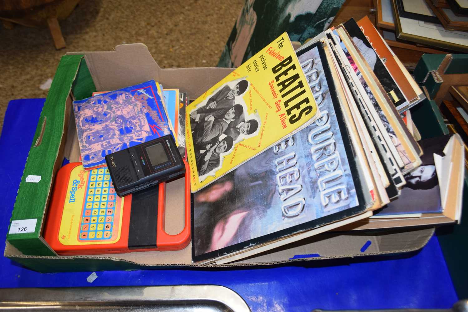 Box of various records, singles and books