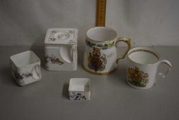 A vintage porcelain cube teapot and accompanying jug and sugar basin plus two further royal