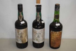 Two bottles of Cossart, Gordon & Cia Madeira 1945 together with one other