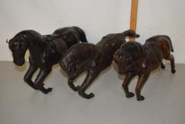 Three vintage leather covered model horses