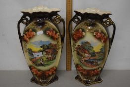 Pair of large early 20th Century porcelain vases decorated with rural scenes